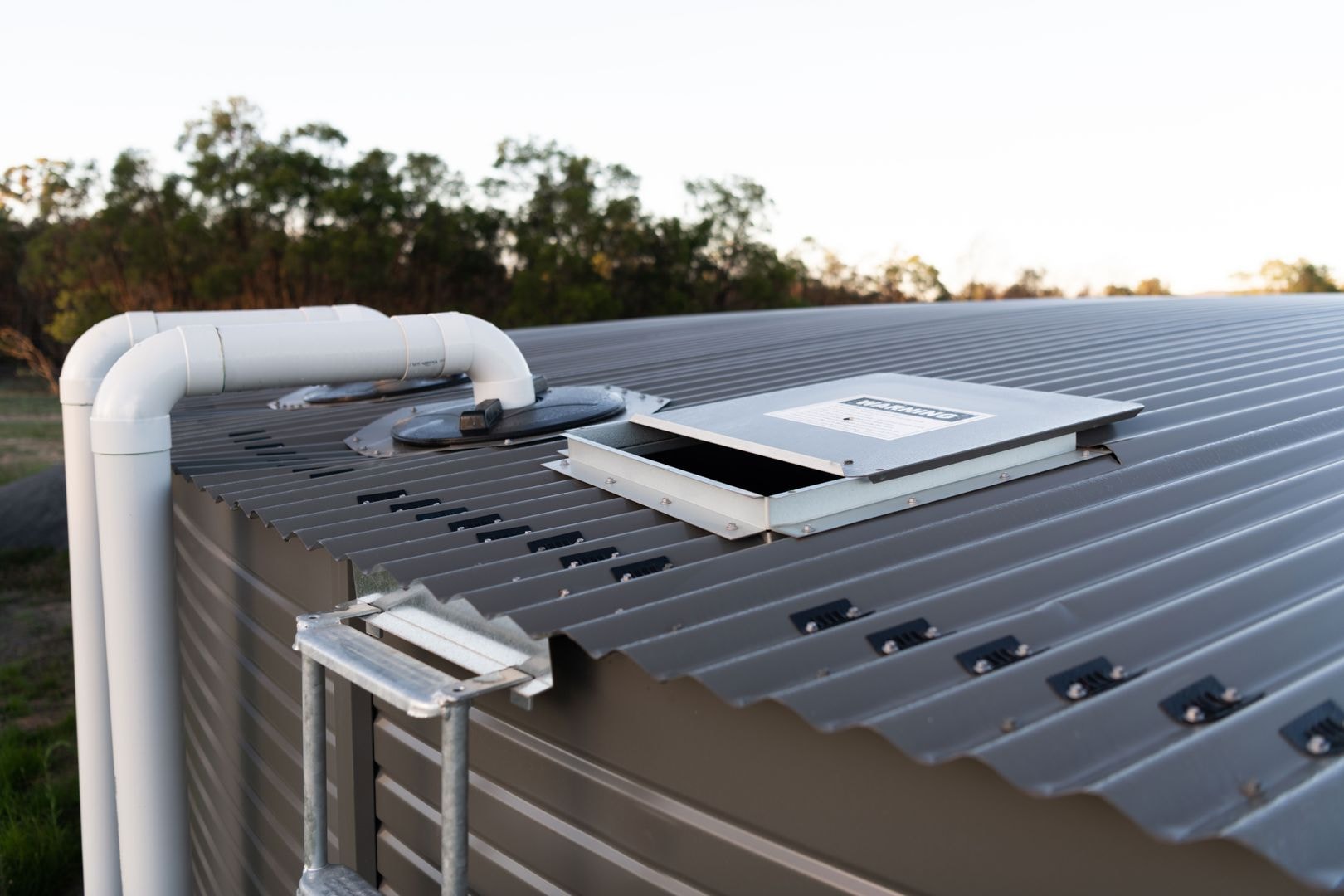 Close-up of Pioneer tank roof hatch and inlet plumbing detail